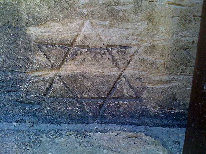 Graffiti talisman of the Star of David on a church near Lisbon's Jewish quarter (Photo: Lisbon Explorer Tours)