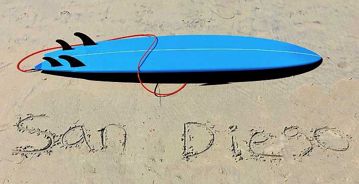 Surfboard on the beach in San Diego (Photo: Envato)