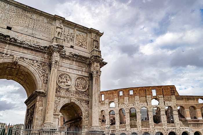 Arch of Titus near ancient Colosseum in Rome (Photo: Envato)