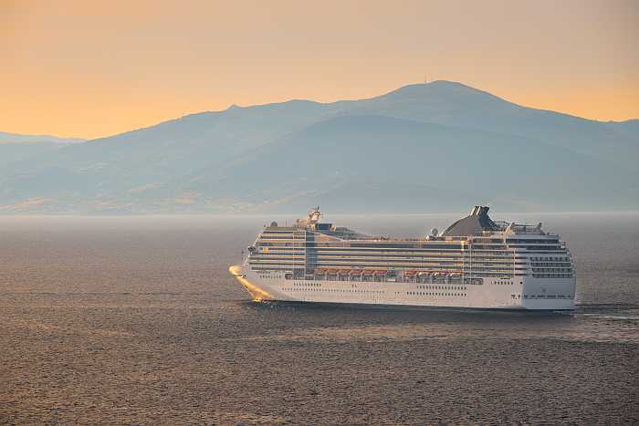 Cruise ship on the sea at sunset (Photo: Envato)