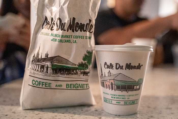 Beignets and cafe au lait from Cafe Du Monde (Photo by Jessica Tan on Unsplash)