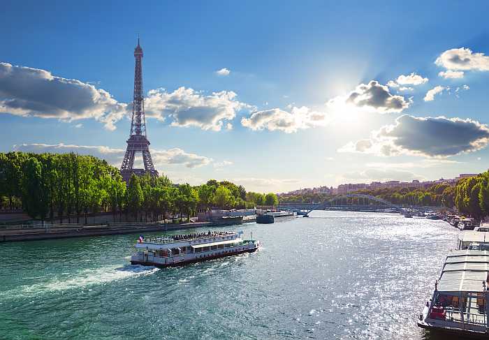 Eifel Tower and bridge lena on the river Seine in Paris, France (Photo: Envato)