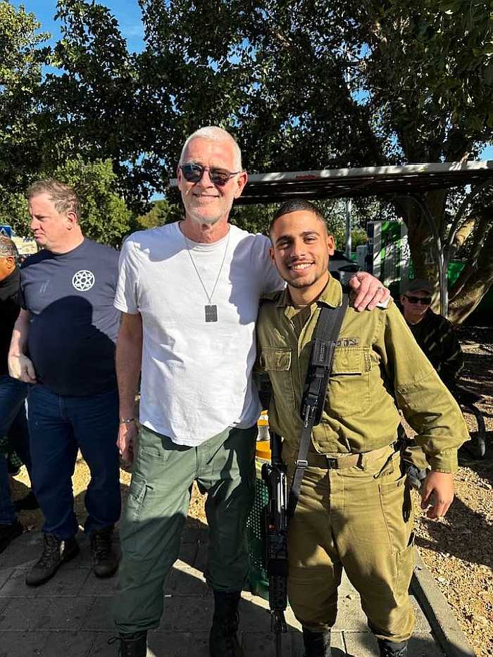 Volunteer on an army base working alongside IDF soldiers